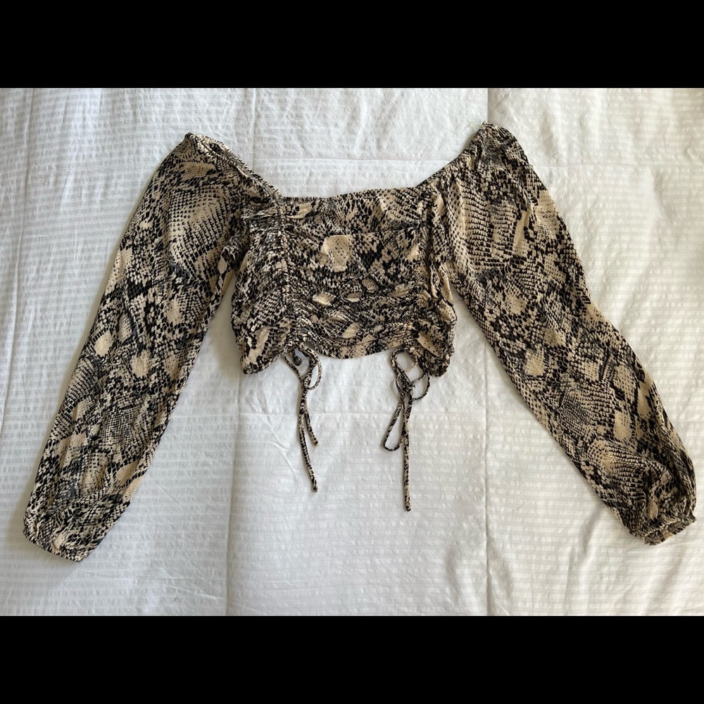 Snake print off the shoulder crop top with ties at bottom.